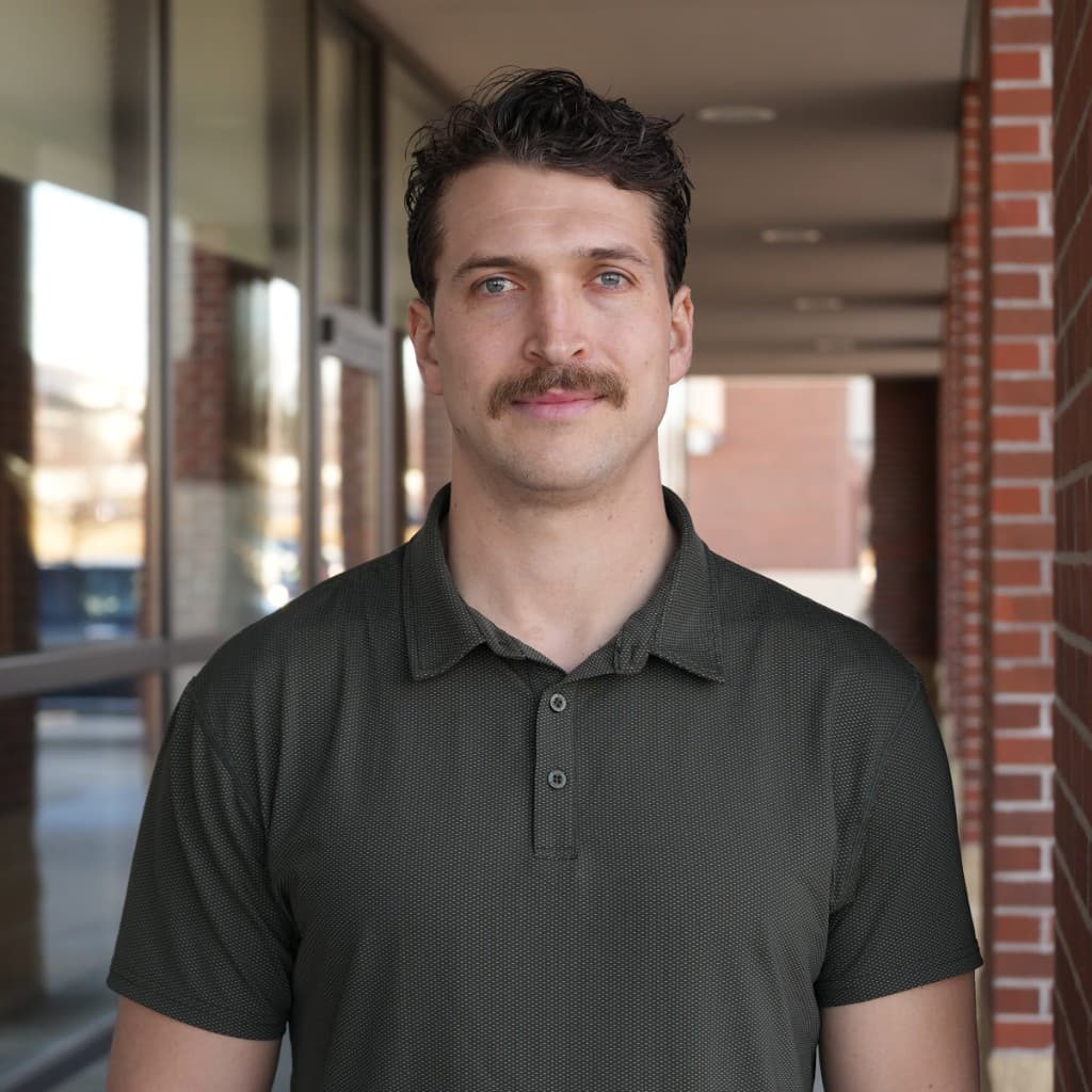 Headshot of JT Seger, cofounder.